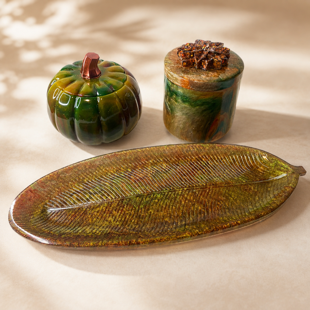 Handmade resin pumpkin jar, decorative container, and autumn leaf tray in burgundy, hunter green, and honey-gold tones